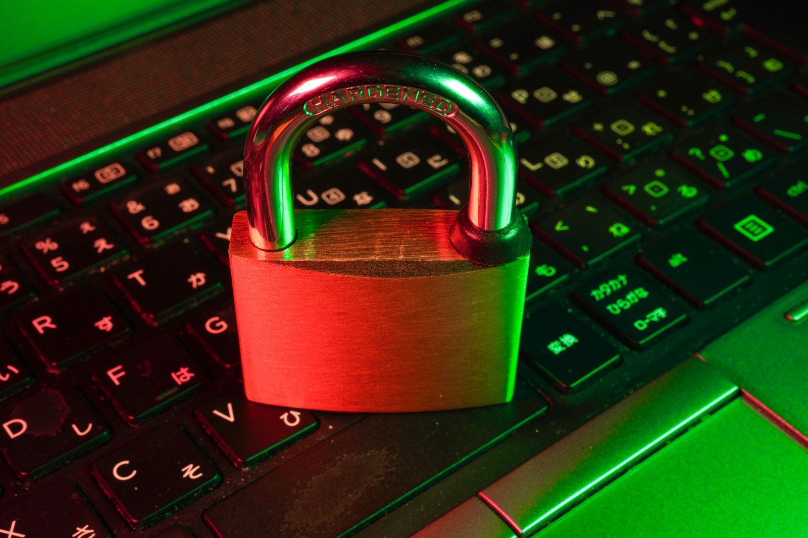 A padlock resting on a laptop keyboard